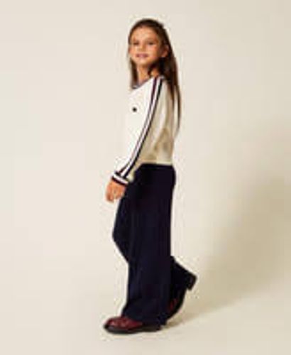 Knit trousers with two-tone stripes