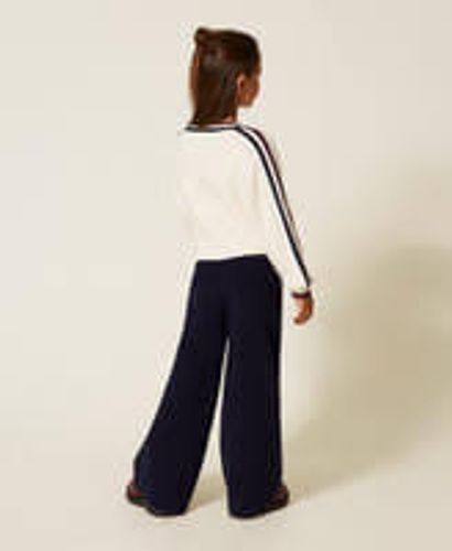 Knit trousers with two-tone stripes