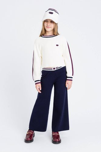 Knit trousers with two-tone stripes