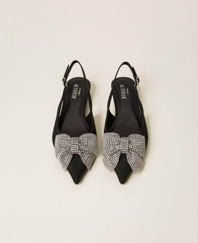 Slingbacks with rhinestone bow