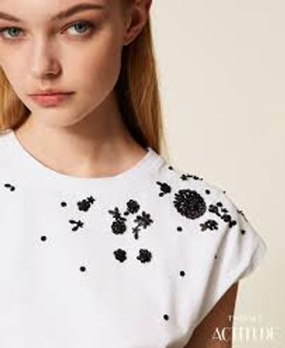 T-shirt with hand-embroidered flowers