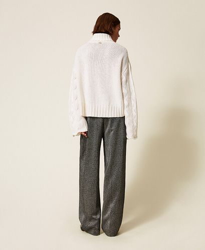 Palazzo trousers with laminated print