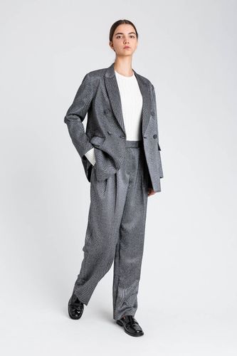 Palazzo trousers with laminated print