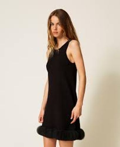 Short knit dress with organza