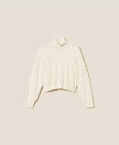 Turtleneck jumper with fringes