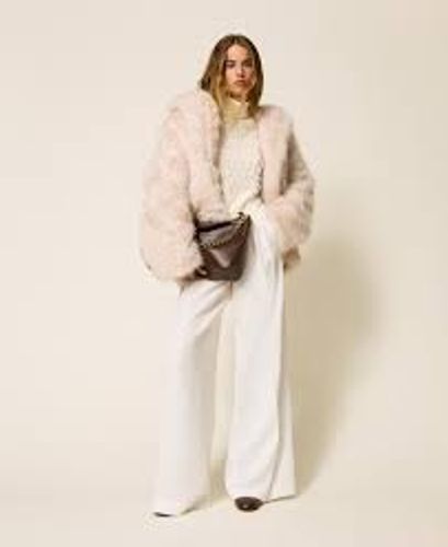 Turtleneck jumper with fringes