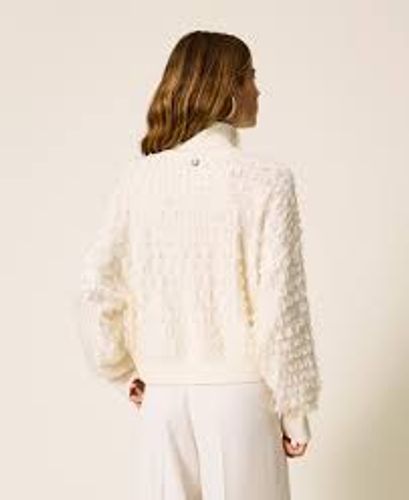 Turtleneck jumper with fringes