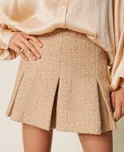 Bouclé miniskirt with sequins