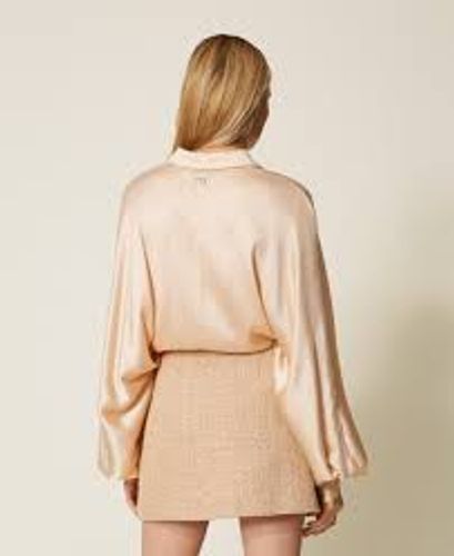Bouclé miniskirt with sequins