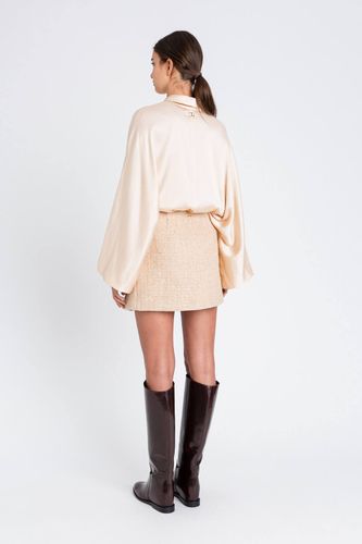 Bouclé miniskirt with sequins