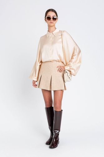 Bouclé miniskirt with sequins