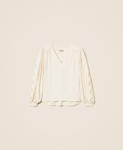 Crêpe blouse with embroidery