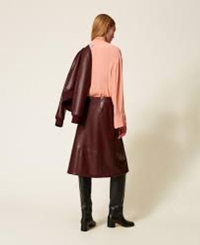 Faux leather midi skirt with buttons
