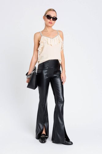 COATED TROUSERS