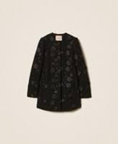 Bouclé coat with flowers and sequins