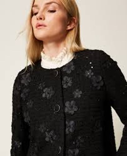 Bouclé coat with flowers and sequins