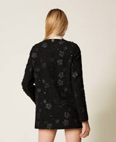 Bouclé coat with flowers and sequins