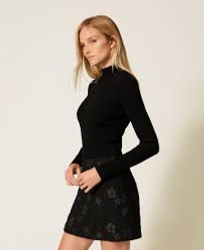 Bouclé miniskirt with flowers and sequins