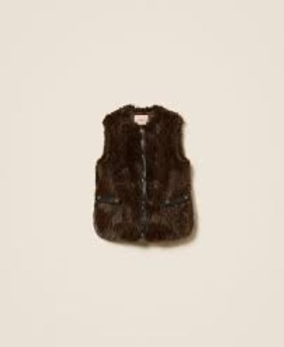 Sleeveless faux fur coat with buttons