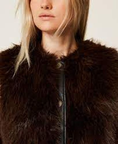 Sleeveless faux fur coat with buttons
