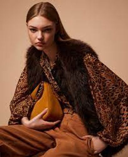Sleeveless faux fur coat with buttons