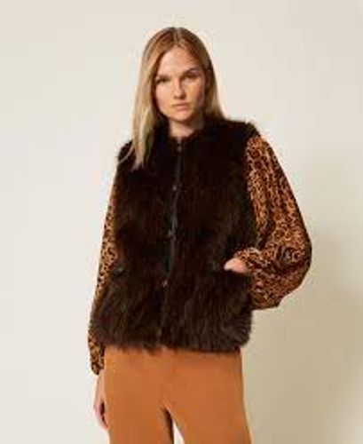 Sleeveless faux fur coat with buttons