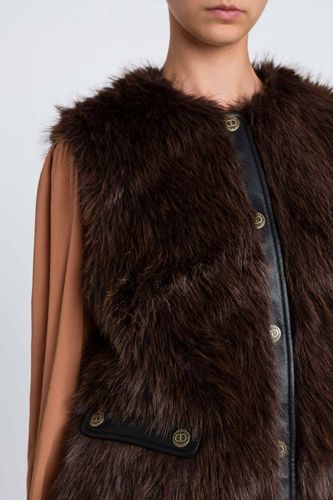 Sleeveless faux fur coat with buttons