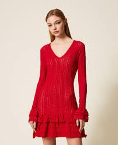 Short knit dress with flounces