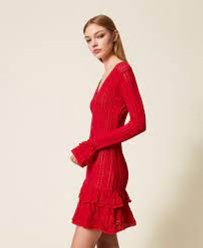 Short knit dress with flounces