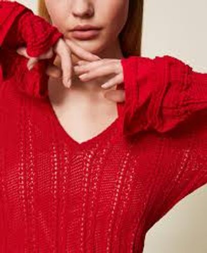 Short knit dress with flounces