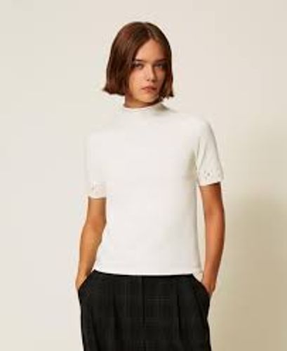 Turtleneck jumper with rhinestones