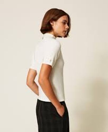 Turtleneck jumper with rhinestones