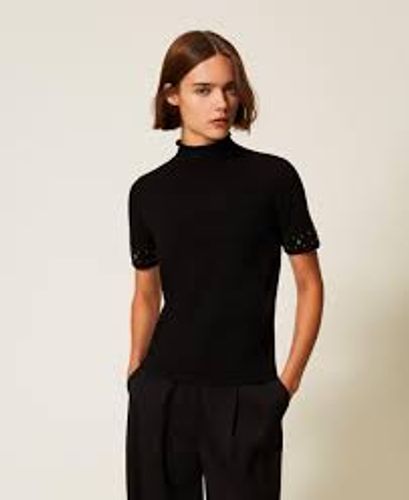 Turtleneck jumper with rhinestones