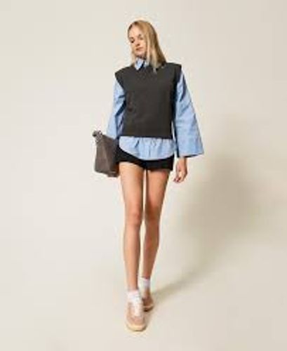 Knit top with wing sleeves
