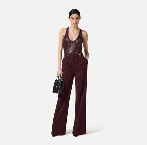 Laminated ribbed knit top