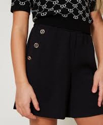 Crêpe shorts with logo buttons