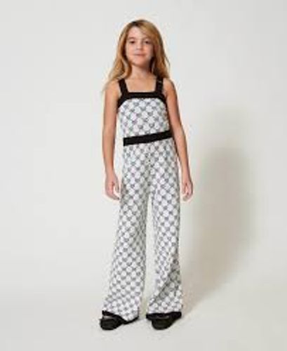 Long knit jumpsuit with jacquard Oval T