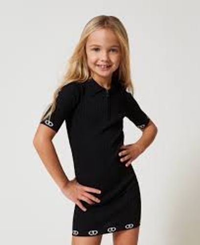 Short knit dress with polo shirt neck
