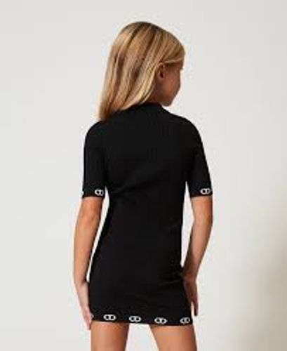 Short knit dress with polo shirt neck