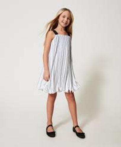 Short pleated dress with print
