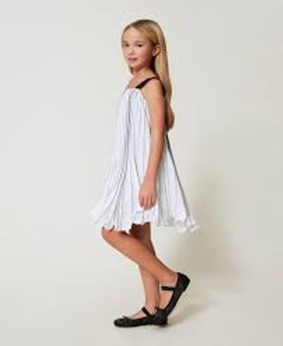 Short pleated dress with print