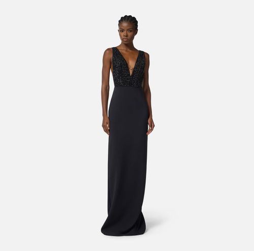 Red Carpet dress in georgette and crêpe fabrics with crystals