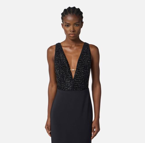 Red Carpet dress in georgette and crêpe fabrics with crystals