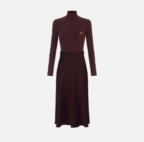 Dress in ribbed knit and satin fabrics with pocket