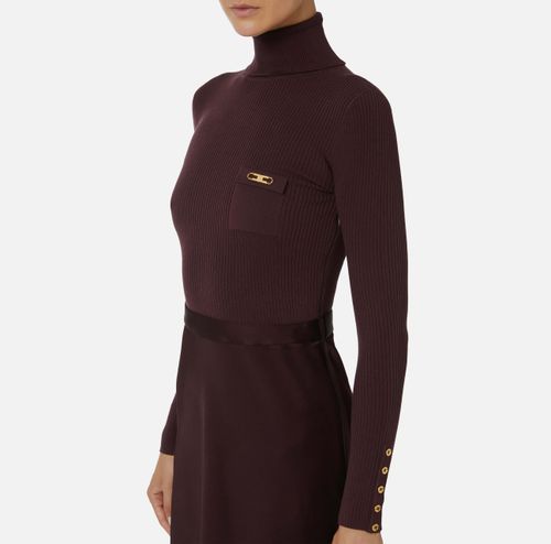 Dress in ribbed knit and satin fabrics with pocket
