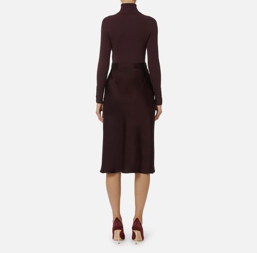Dress in ribbed knit and satin fabrics with pocket