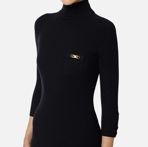 Dress in ribbed knit fabric with breast pocket