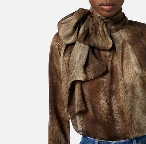 Blouse in voile fabric with python print