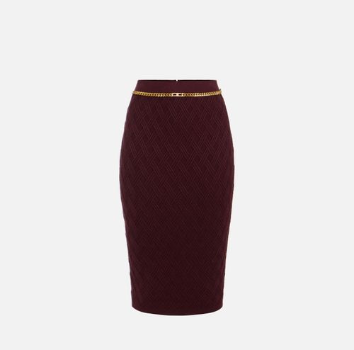 Skirt in knit fabric with diamonds and jewel details