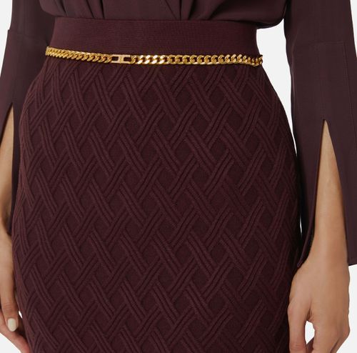 Skirt in knit fabric with diamonds and jewel details